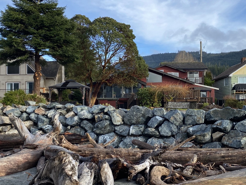 View of Big Fish Lodge from the beach. Located in Port Renfrew, British Columbia